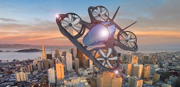 Evtol flies through a city in a simulated image.